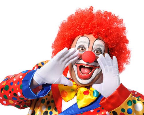 Portrait of a screaming clown isolated on white background